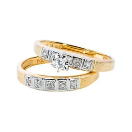                                                              							10K 1/8CTTW DIAMOND BRIDAL SET
                                                            						 